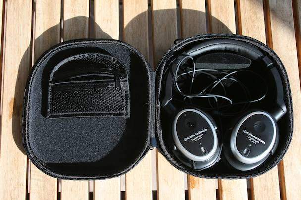 A small pocket on the left holds the headphone <em>accoutrements<em>.