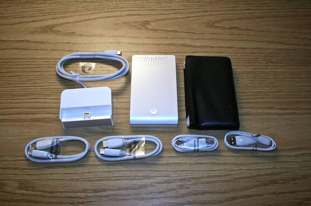 In the box: drive, case, FireWire 800 dock, and more cables than the Golden Gate Bridge: FireWire 800, FireWire 800 to 400, USB, USB auxiliary power cable.