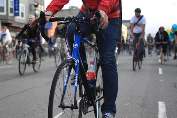 Cyclists ride down San Francisco's Folsom Street during one of the city's legendary critical Mass rides.