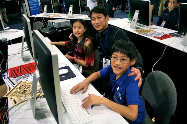 Steven Chan and two of his three kids, Megan and Matthew, who all share the same initials: M - A - C.