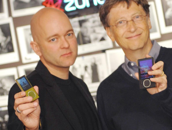 Microsoft's James J Allard (seen here with Bill Gates) is leaving the company, largely because of failed attempts to match Apple's iPod, iPhone and iPad.