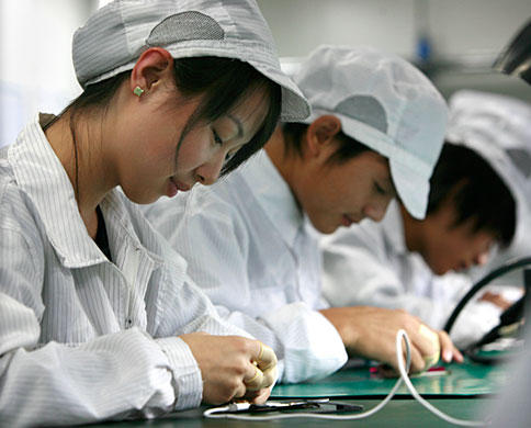 Foxconn workers, courtesy Apple.