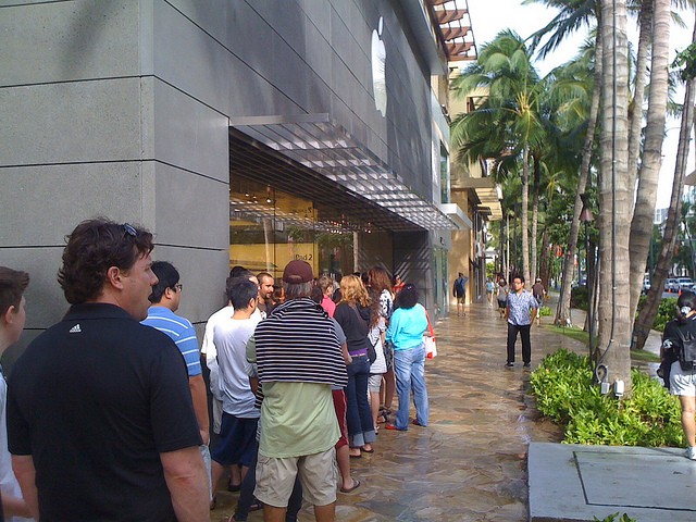 The line for iPad 2s outside the Waikiki Apple Store. The same lines appear every day, one week after the iPad 2s launch. Photo by Jayson Smith: http://www.flickr.com/photos/jaysonsmith/5537484729/in/photostream/