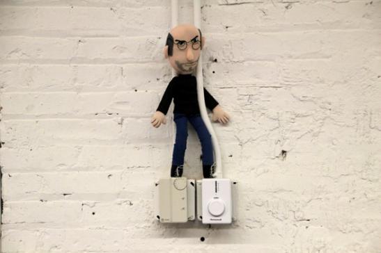 Of course every serious design shop needs a steve jobs doll