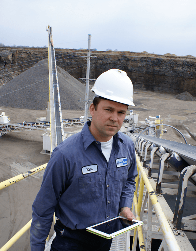 Ross Duff of Huntsville, Ohio's Duff Quarry. The iPad gets operators outside the control room. (Credit: Rock Products Magazine)