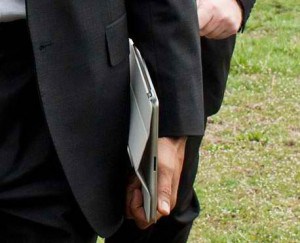 man holding iPad with case