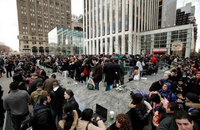 Customers line up for the new iPad outside of Apple's Fifth Avenue store.