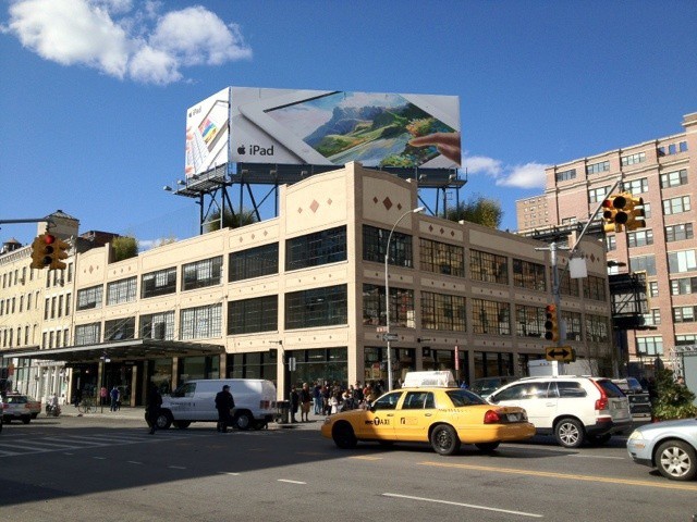 An ad for the new iPad atop NYC's 14th Street Apple Store. Photo by Dan Frommer