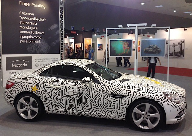 The fingerpainted car on display at Expo Arte in Italy. Courtesy Matthew Watkins.