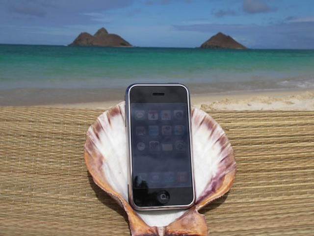 Using personal iPhones and iPads in the office, leads many people to work from them while on vacation.