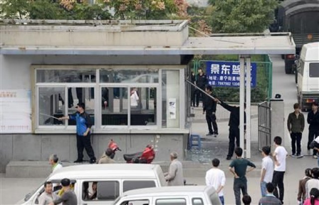 The riot resulted in broken windows at the Foxconn factory.