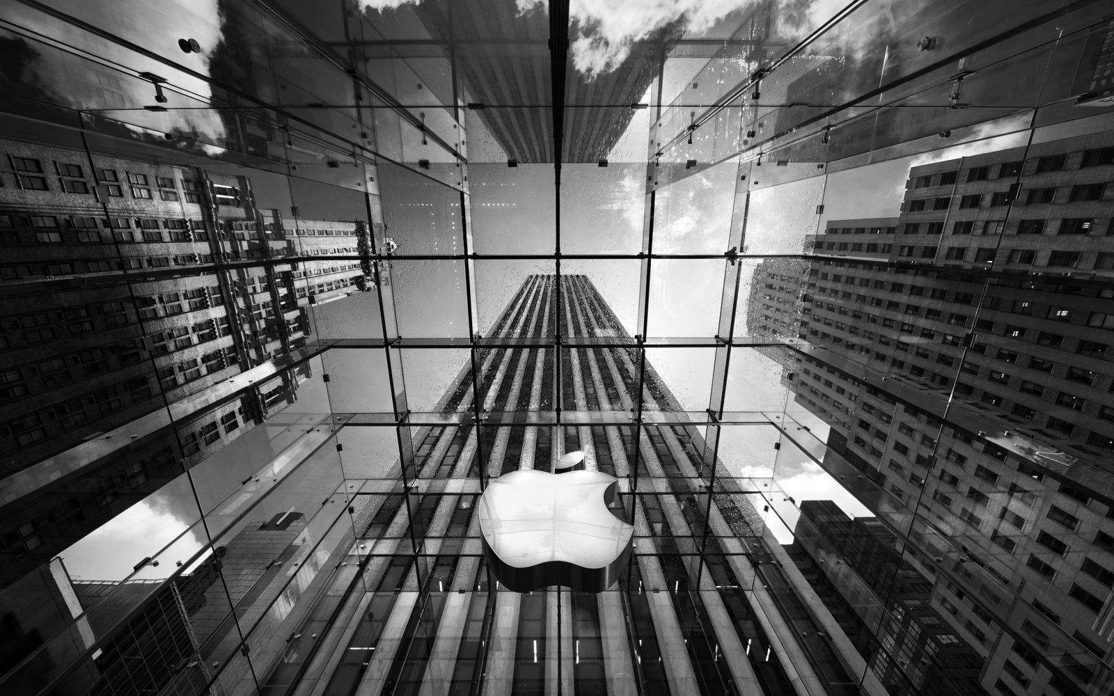 apple_sign_on_building_in_black_and_white-wide