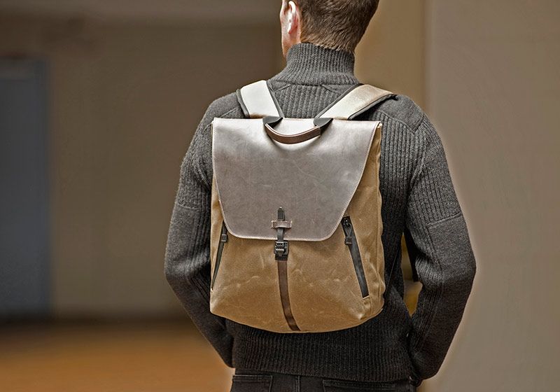 staad-backpack-lifestyle-man-carrying-stout-waxed-canvas