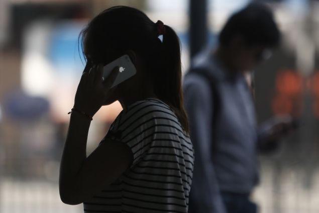 woman-talking-on-iphone-reuters-635