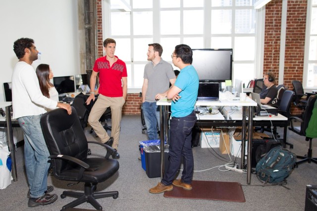 A stand up meeting in Automatic's San Francisco offices keep things moving forward. 