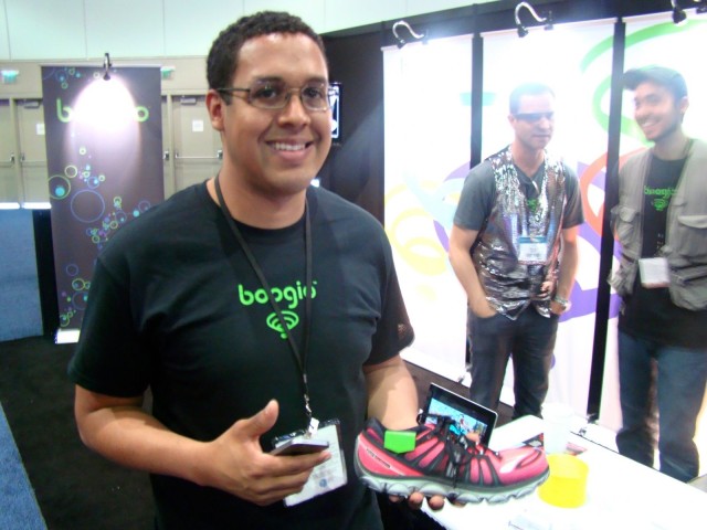 Boogio CEO Jose Torres showing off the shoe sensor and mobile app. Photo: Rob LeFebvre/Cult of Mac