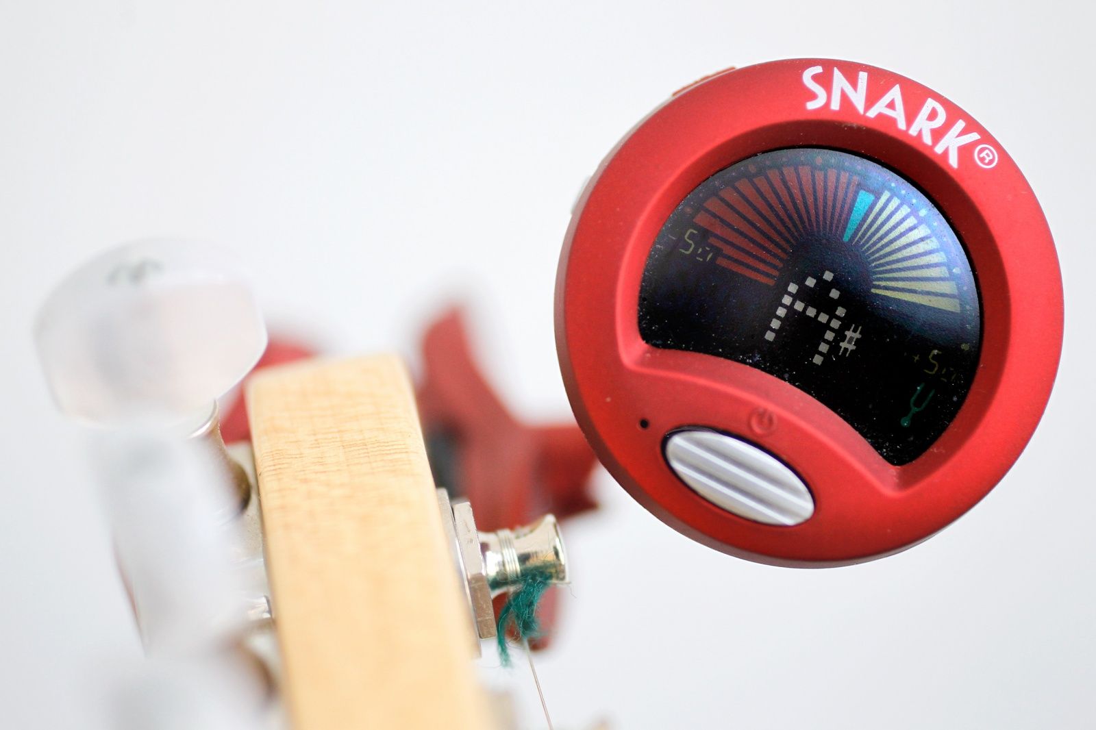 If you don't have a dedicated roadie or one of those robotic tuning guitars, there's no easier way to tune your ax than with a Snark. Just squeeze the thumb-size mount and slide your headstock between the rubberized grips. Then press the little button on the front of the Snark's colorful LCD readout, pluck a string and get your instrument ready to play.


Lightweight and accurate, the Snark SN-2 All Instrument Tuner works with acoustic or electric guitars and basses, mandolins, banjos, whatever. It's perfect for situations like in-studio radio shows, where you don't want to drag around a stompbox tuner or a large amp that might have one built-in tuner. It also boasts pitch calibration, which lets you tune to something besides A-440, and a metronome that I can't complain about because I've never used it. The Snark SN-2 is a great buy at $39 list (and a steal at Amazon's price of $12.99). — Lewis Wallace


Photo: Jim Merithew/Cult of Mac