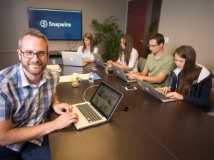 Newell (left) with the Snapwire team.