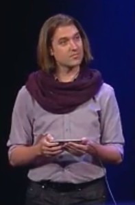 Tommy Krul’s scarf threatened to overshadow almost everything at Tuesday’s keynote. Screengrab: Cult of Mac