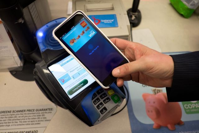 Apple Pay in action. Tap, touch and done. Photo: Jim Merithew/Cult of Mac