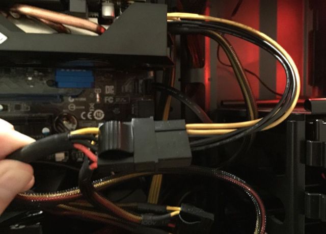Your graphics card may require an adapter like this one. Photo: Killian Bell
