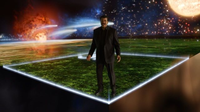 Neil de Grasse Tyson points out the tiny, insignificant speck that represents all of human history against the universe in Cosmos: A Spacetime Odyssey. Photo: Fox
