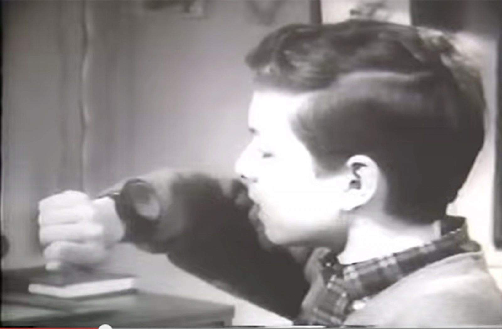 A child calls a buddy on his Dick Tracy Two-Way Wrist Radio in this 1960s commercial.