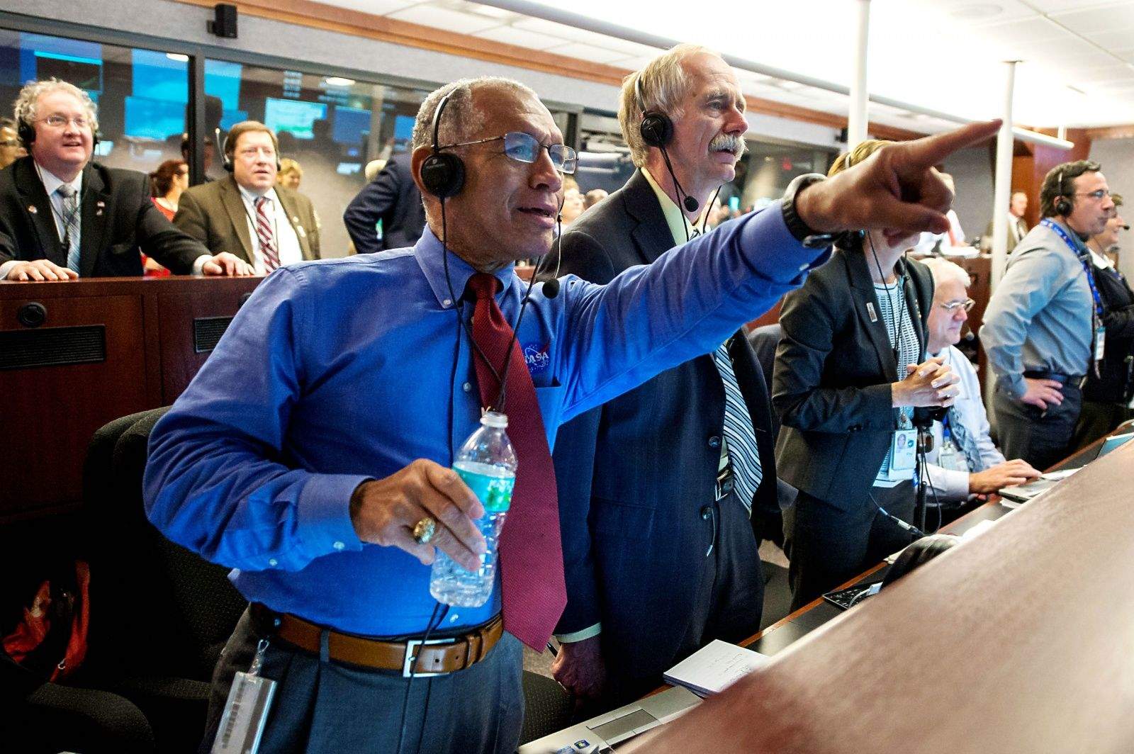 NASA Administrator Charles Bolden, left, NASA Associate Administrator for the Human Exploration and Operations Directorate William Gerstenmaier, and others in Building AE at Cape Canaveral Air Force Station, react as they watch the Orion spacecraft splash down in the Pacific Ocean a more than three hours after launching onboard a United Launch Alliance Delta IV Heavy rocket from Launch Complex 37, Friday, Dec. 5, 2014, Cape Canaveral, Florida. The Orion spacecraft orbited Earth twice, reaching an altitude of approximately 3,600 miles above Earth before landing. No one was aboard Orion for this flight test, but the spacecraft is designed to allow us to journey to destinations never before visited by humans, including an asteroid and Mars.
Photo: Bill Ingalls/NASA