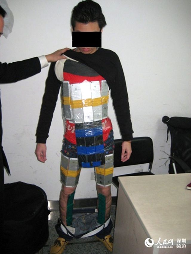 A Hong Kong man was seen walking awkwardly at Fultan Port in China. After setting off alarms, customs officials found 94 iPhones taped to his body. Photo: Sina News A Hong Kong man was seen walking awkwardly at Fultan Port in China. After setting off alarms, customs officials found 94 iPhones taped to his body. Photo: Sina News