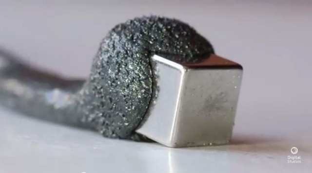 Magnetic putty contains tiny micron-sized micro magnets that get charges when around a magnet. Photo: Joey Shanks/YouTube