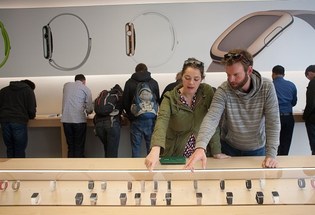 Mel Togusen, left, and her friend,  Chris Brown, look at different styles of Apple Watches. Photo: David Pierini/Cult of Mac