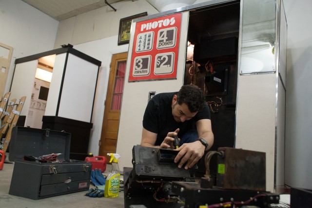 Anthony Vizzari repairs a photo booth in his Chicago studio. Photo: David Pierini/Cult of Mac
