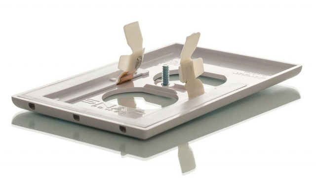 The power prongs on the SnapPower draws power from screws inside the outlet. Photo: SnapPower