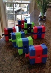 MeezyCube adds a little custom color to your MacBook power adapter.