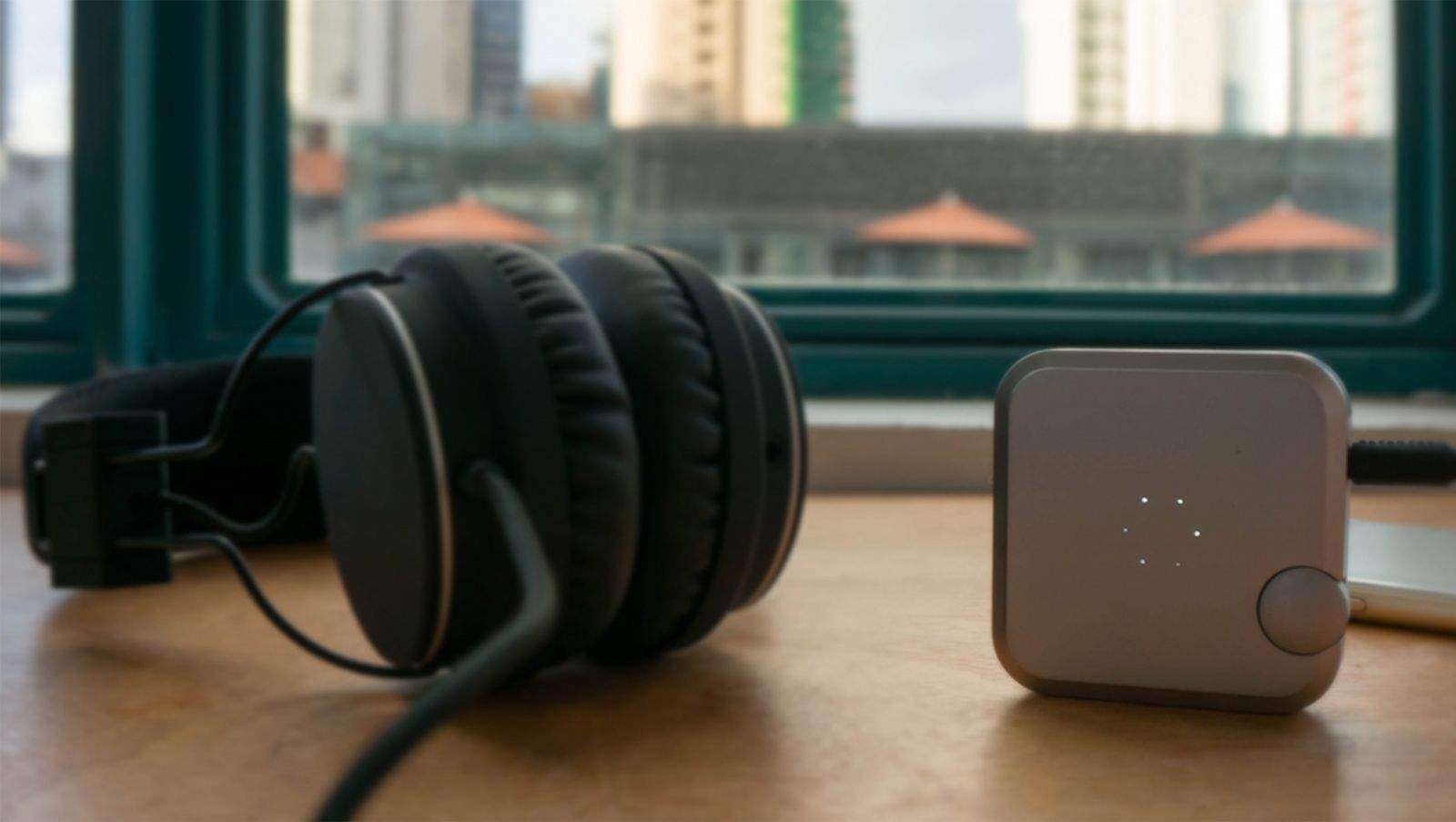 The Aumeo audio device, right, boosts clarity of sound so that your don't risk hearing loss by increased volume.