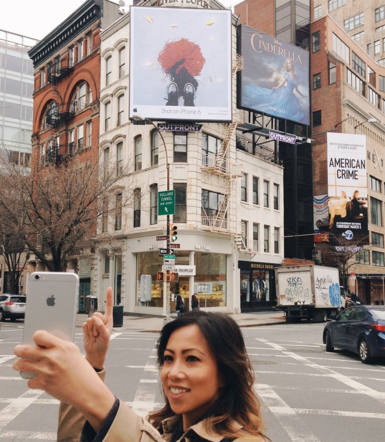Cielo de la Paz with her "Shot on iPhone 6" billboard in New York in April.