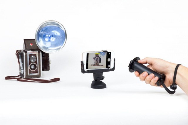 The detachable tilting base can rest on a flat surface or be mounted in other places, like a bike helmet.