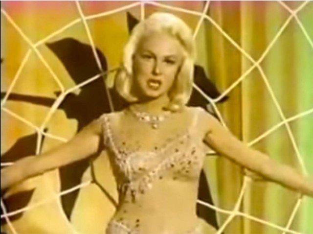 Joi Lansing is caught in "The Web of Love."