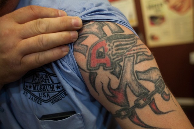 Gasko loved Air-Way vacuum cleaners and its insignia is at the center of this tattoo.