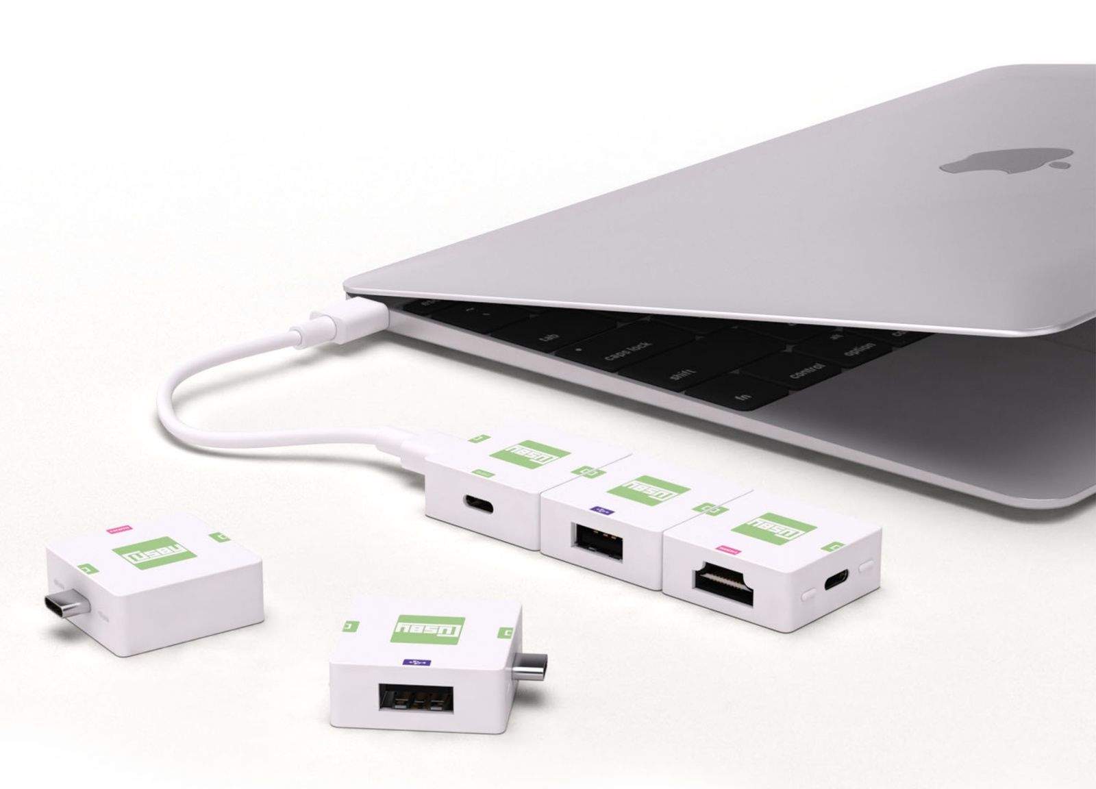 Cusby adapters  allow you to plug into the new MacBook with a single USB-C port.