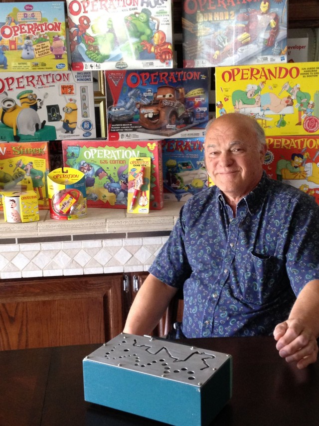 John Spinello in his Illinois home with his prototype box that led to the creation of the game Operation.