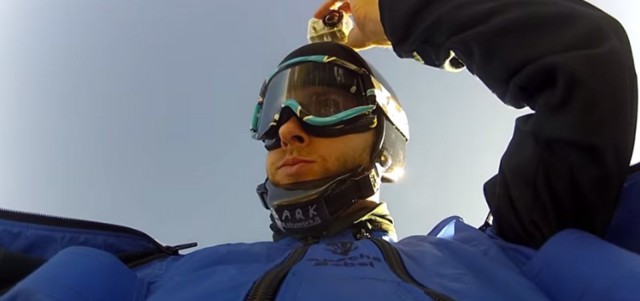 Uli Emanuele calmly adjusts his GoPro camera before his flight. Uli Emanuele calmly adjusts his GoPro camera before his flight.