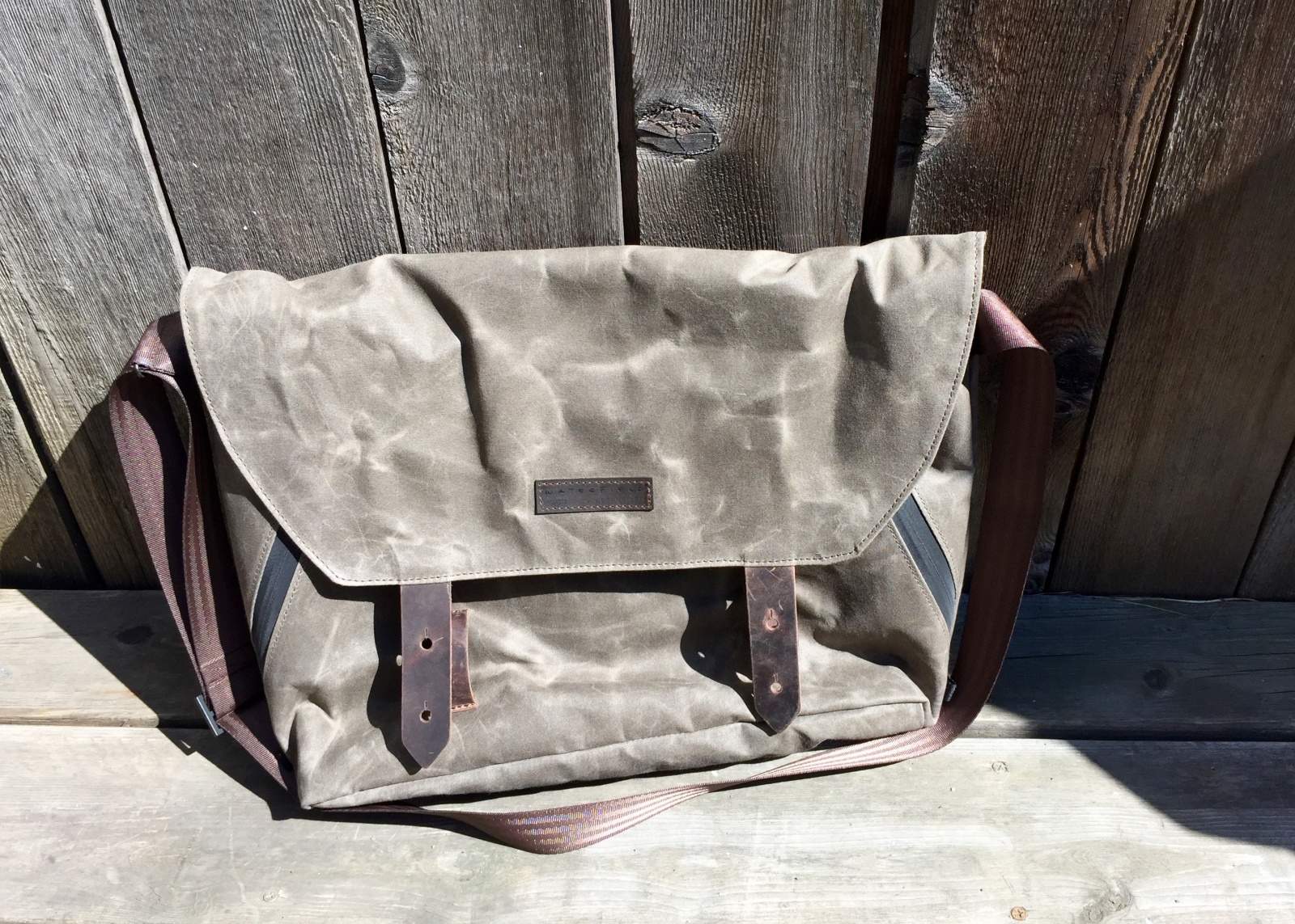 Get all your stuff together in this lightweight, classy, functional messenger bag.