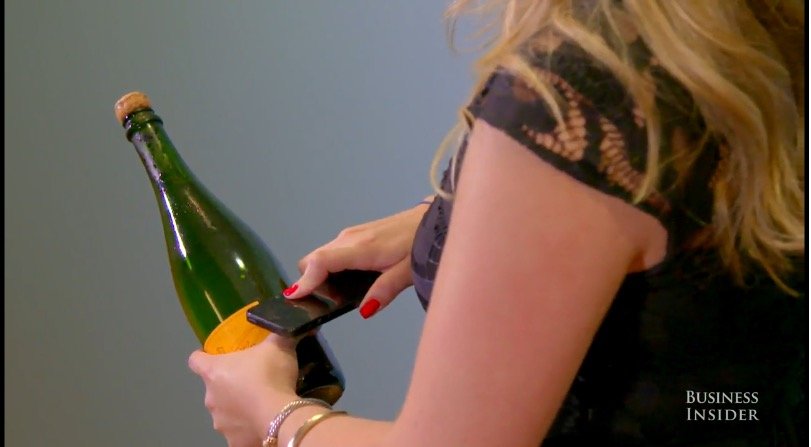 How to saber open a bottle of champagne with an iPhone.