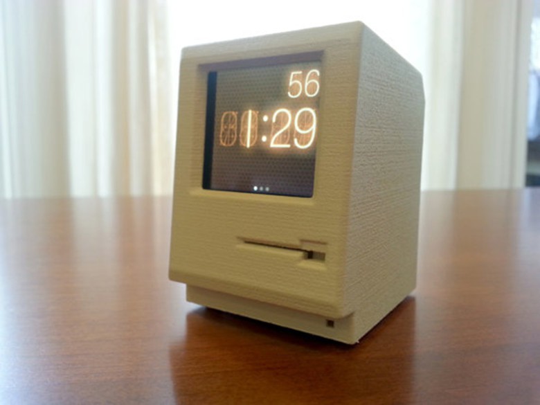 Mangin created a classic Macintosh that works as a dock for the iPod Nano.
