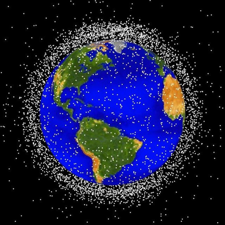 A satellite image shows the field of space debris around the Earth.