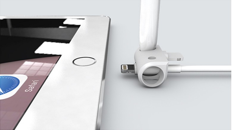 The Quarter can hold the Apple Pencil three different ways. Here, the iPad charging cord is threaded through the holder. 