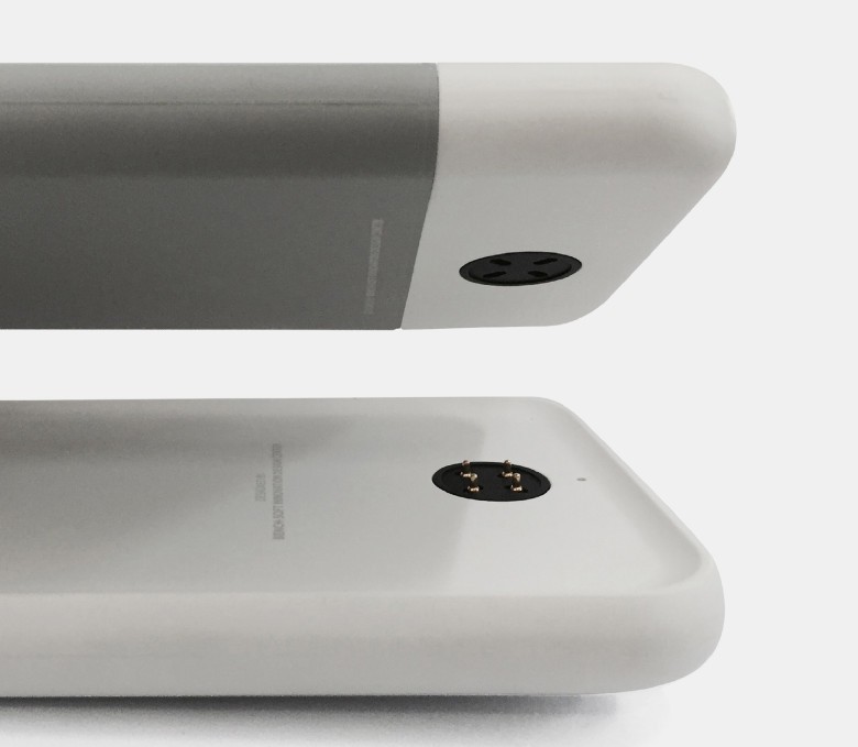 The case and dock connect magnetically, allowing for both charging and syncing. 