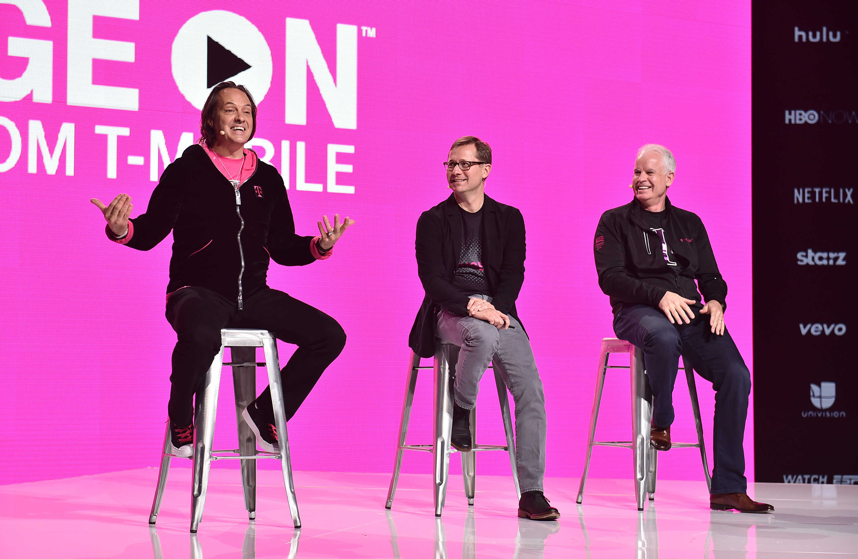 T-Mobile CEO John Legere answers questions at an event in Los Angeles.