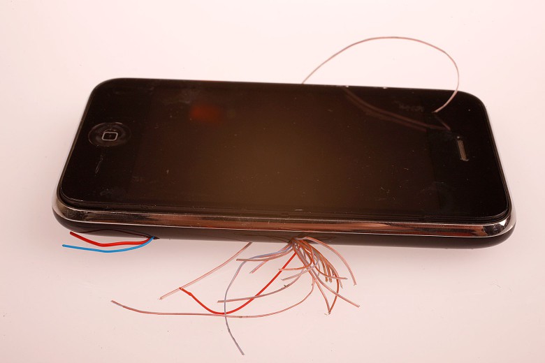 A prototype Apple iPhone 3G. The wires are for heat testing. 